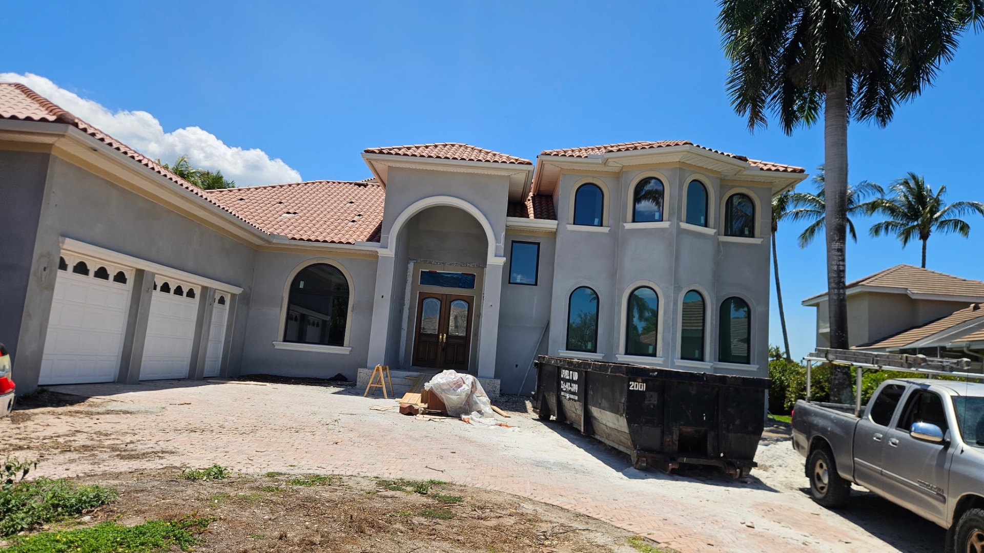 Full exterior stucco and foam trim installation